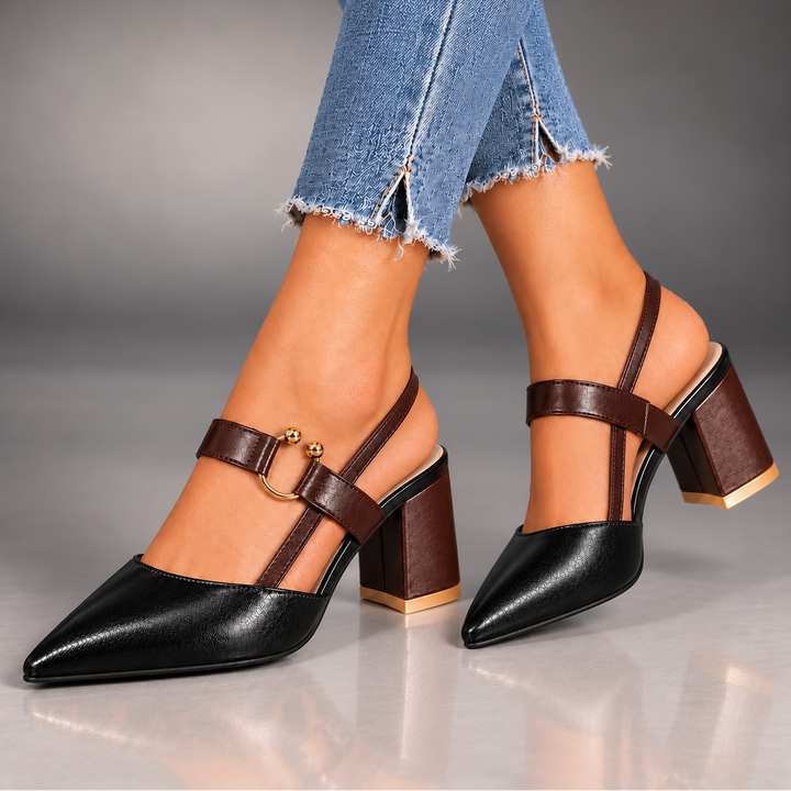 Marigold slingback in Classic Black worn with jeans, angled front view