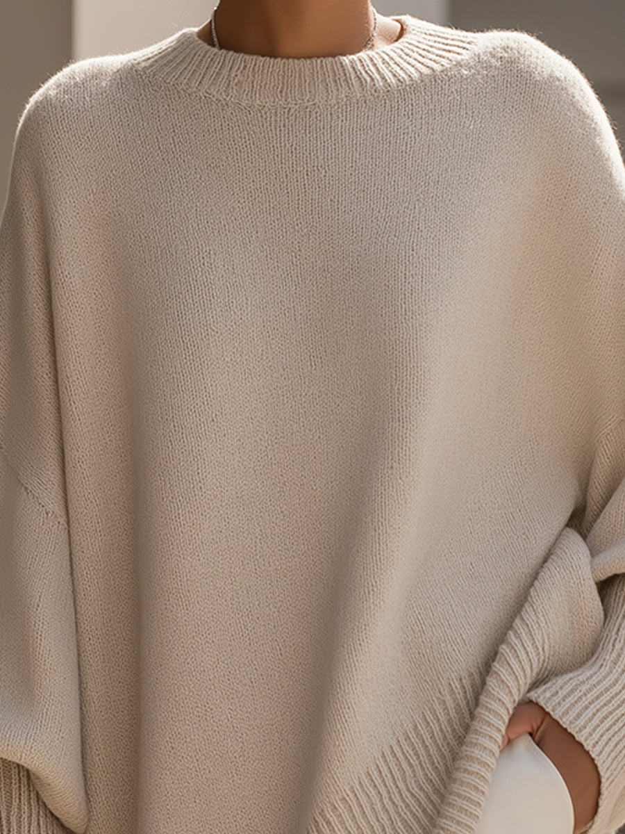 Eugenie oversized relaxed-fit sweater, close-up of the ribbed neckline and soft knit