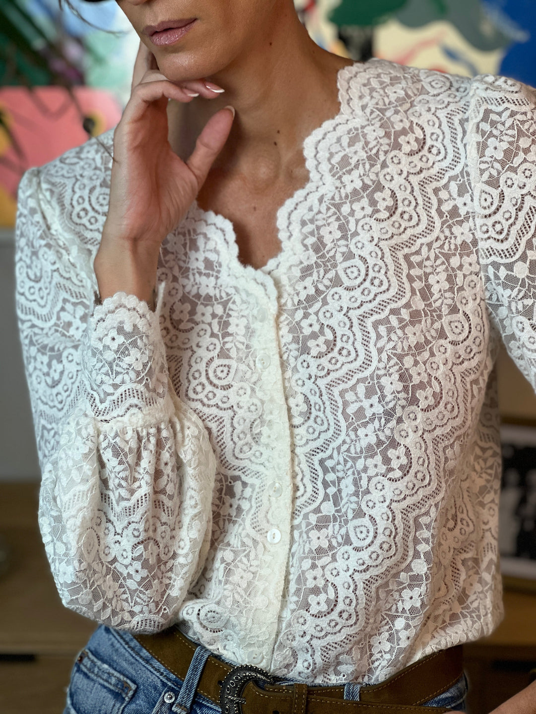 Hedda knit-lace button-front blouse in Beige, close-up of the neckline and tonal floral lace pattern
