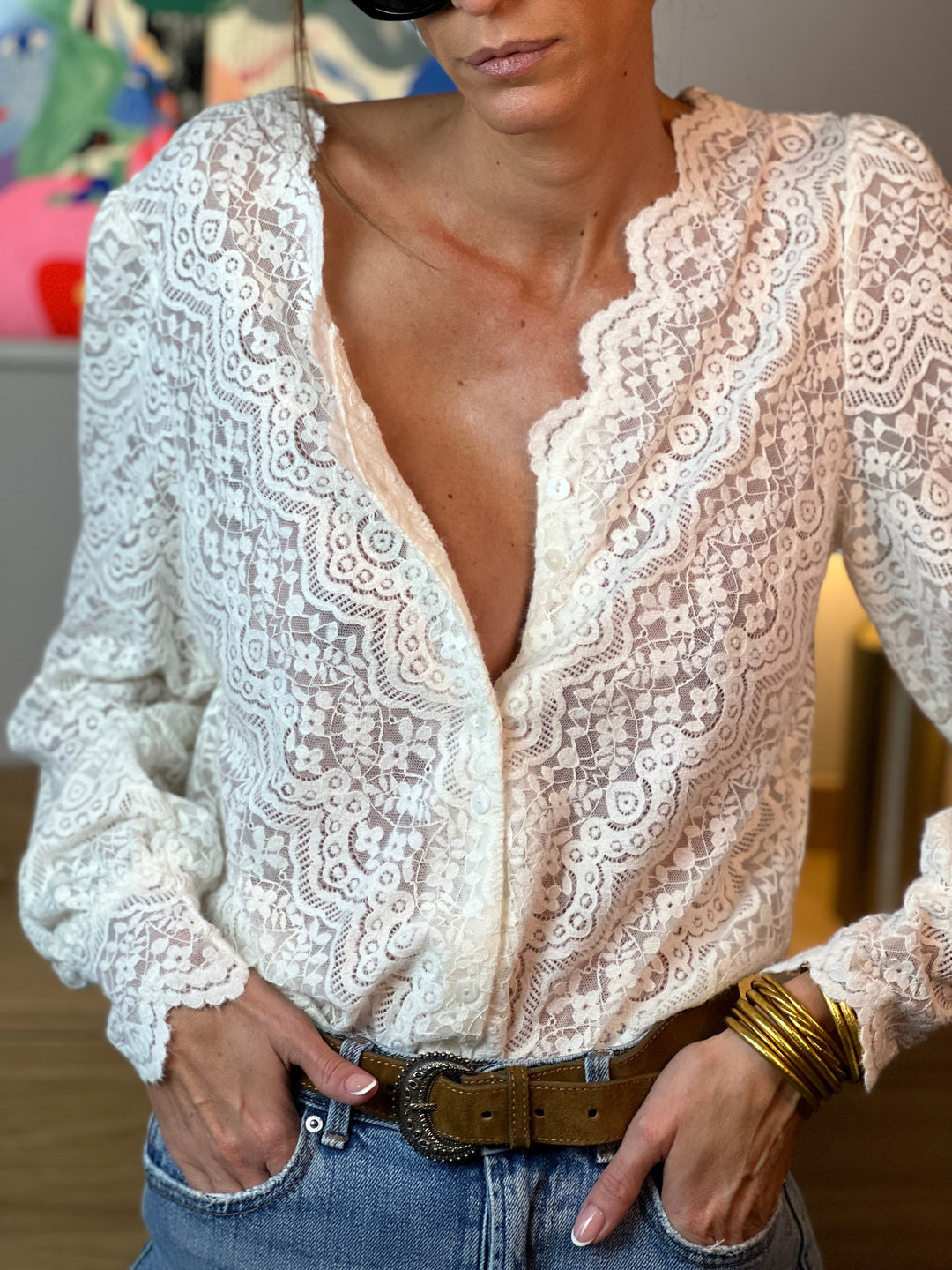 Hedda knit-lace blouse in Beige, front view showing the deep V-neckline and button-front