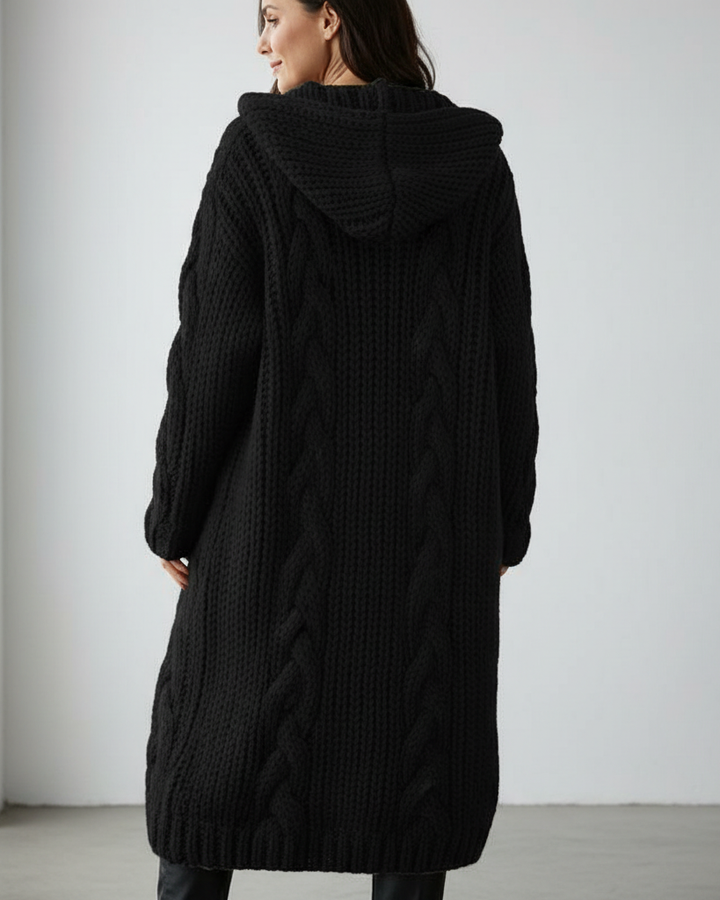 Maribelle cable-knit cardigan in black, back view with hood