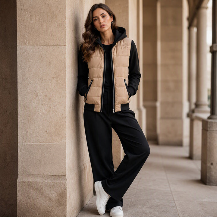Winona color-block hooded jacket in khaki-tan with black contrast hood and sleeves, model shot outdoors