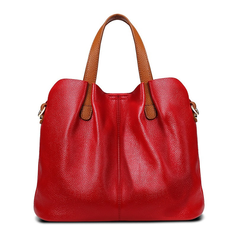 Gemma genuine leather handbag in red litchi grain leather with tan top handles and a soft, slouchy shape